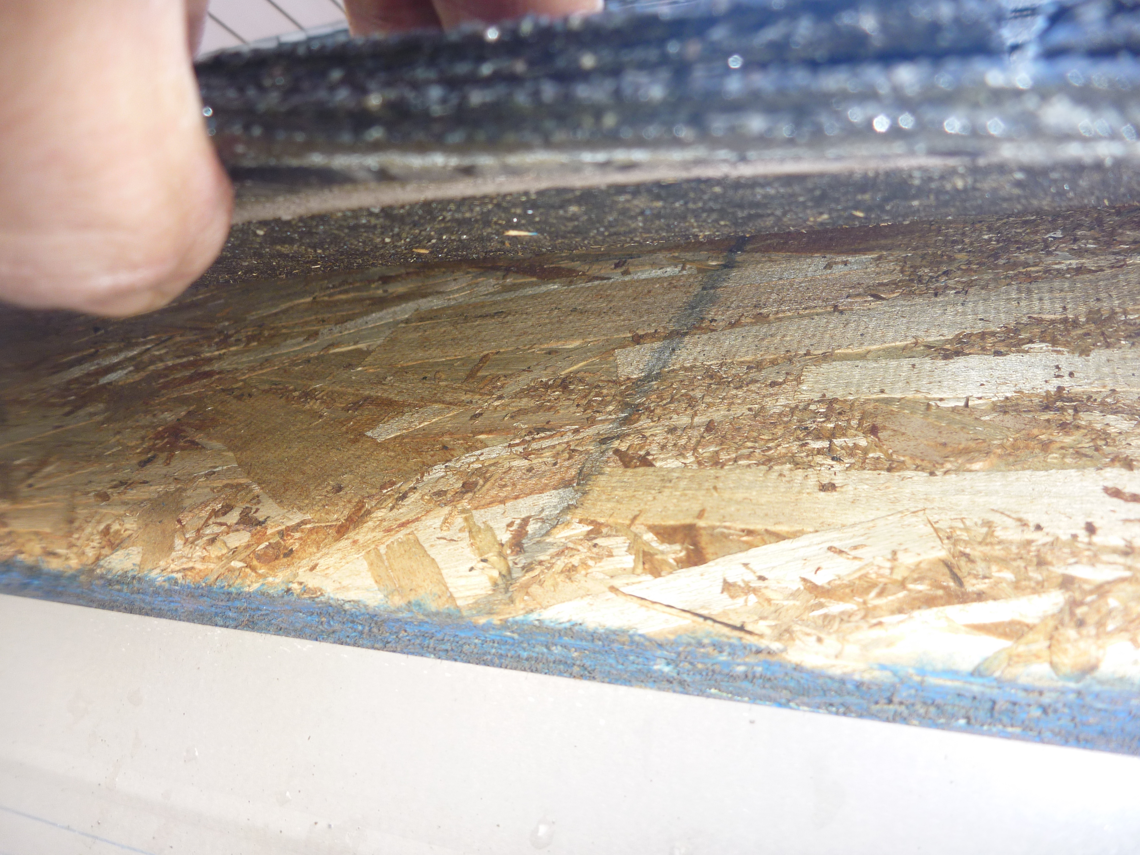 Missing building paper on this home's roof in Dallas Oregon.  Noted on a home inspection.